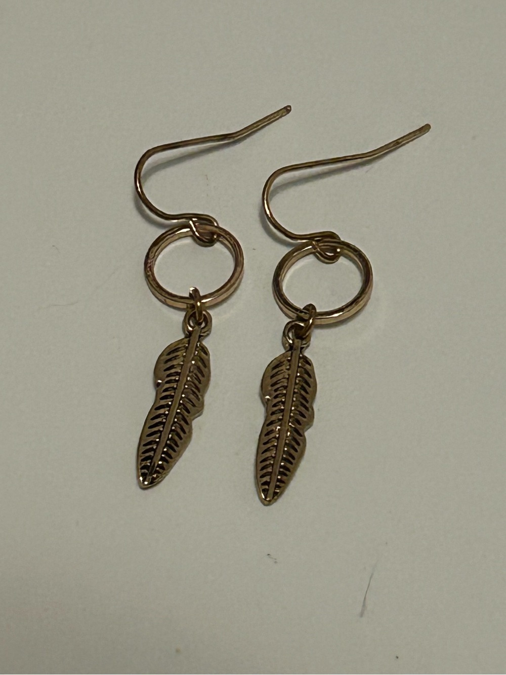 Delicate Gold Feather Drop Earrings with Hoop Accent